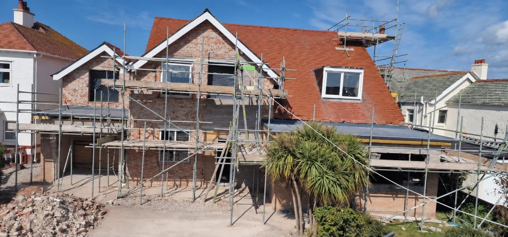 Residential building renovation with scaffolding